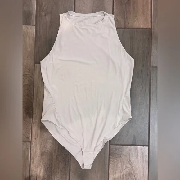Lululemon Wundermost High-Neck Bodysuit in Mojave Tan size L Great Condition! - Picture 9 of 9